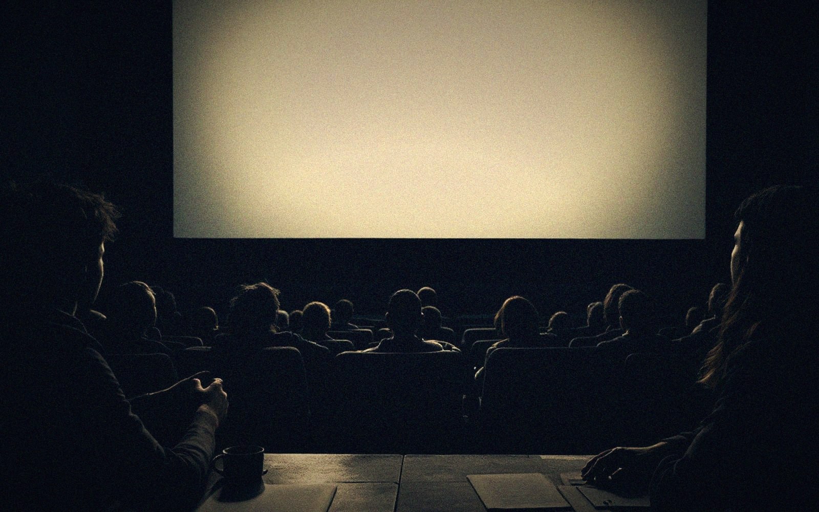 A blank lit screen in an empty house
